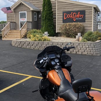 Docksiders Pub & Oven - a motorcycle parked in front of a building - Pizza Near Me - Hilton, New York Docksiders Pub & Oven - a motorcycle parked in front of a building - Pizza Near Me - Hilton, New York