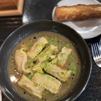 Aster - Agnolotti pasta, duck filling and delicious broth/sauce - Salad Near Me - Midland, Michigan