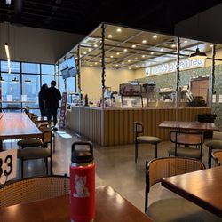 Nana's Green Tea - Long community table, order area