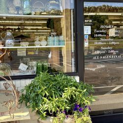 Ginger and Pickles Antiques - Close-up to curiosities inside.