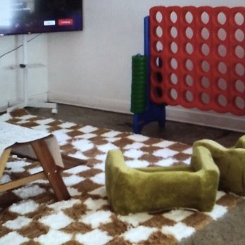 Whimsy Pasadena - small section for kids to play games.. like connect four and eat at the table. Chill on the cute small arm chairs..:-)) - Venues & Event Spaces Near Me - Pasadena, California