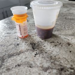 B&G Milkyway - $2.50 order of baked beans. Pill bottle for scale...