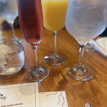 The Garden Brunch Cafe - Cranberry mimosa, orange juice, and water - Breakfast & Brunch Near Me - Memphis, Tennessee The Garden Brunch Cafe - Cranberry mimosa, orange juice, and water - Breakfast & Brunch Near Me - Memphis, Tennessee