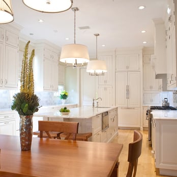 Builderzz Inc - a kitchen with a dining table and chairs - General Contractors Near Me - Los Angeles, California