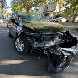 Acme Auto Body - Picture of car with front end damage