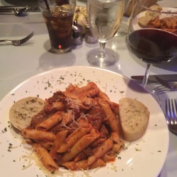 Paradisio - Penne pasta with meat sauce and homemade sausage and fresh garlic bread. Incredible. Not to mention the house Merlot to pair. - American Near Me - Redding, California