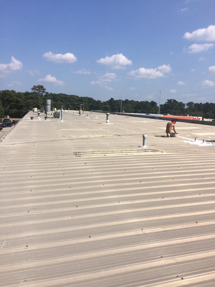 Slide of Advanced Roofing & Paving