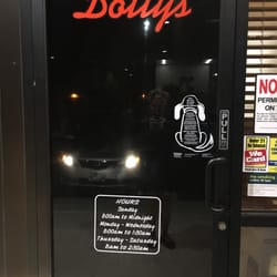 CLOSED sign says open till MIDNIGHT