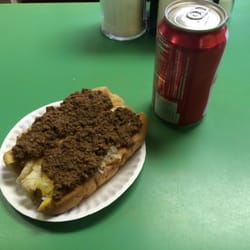 M & M Red Hots - Two with meat sauce and a coke.