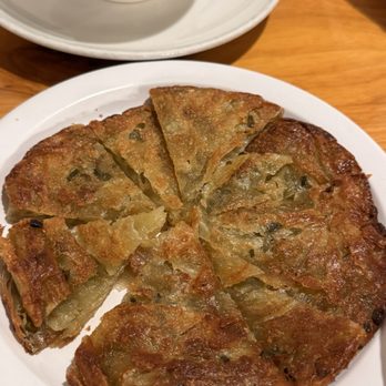 Hu's Cooking - Scallion pancake - Chinese Near Me - Houston, Texas Hu's Cooking - Scallion pancake - Chinese Near Me - Houston, Texas