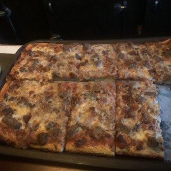 Ralph's Tavern - Ten cut pizza with sausage, meatballs, and bacon. - Italian Near Me - Albany, New York