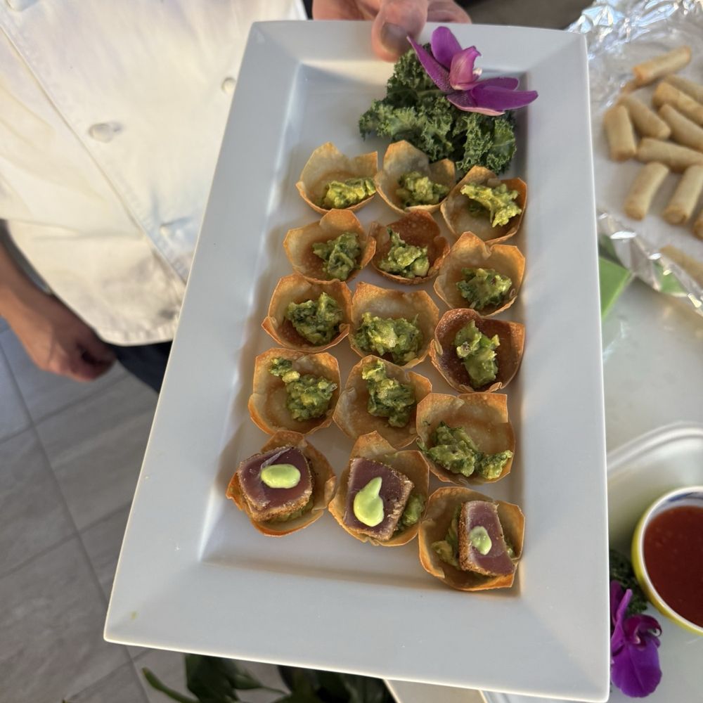 Fusion Flair - Dreaming of: Seared Ahi-bites on a light-wonton shell, over bed of guacamole and a dash of wasabi heaven! - Caterers Near Me Fusion Flair - Dreaming of: Seared Ahi-bites on a light-wonton shell, over bed of guacamole and a dash of wasabi heaven! - Caterers Near Me