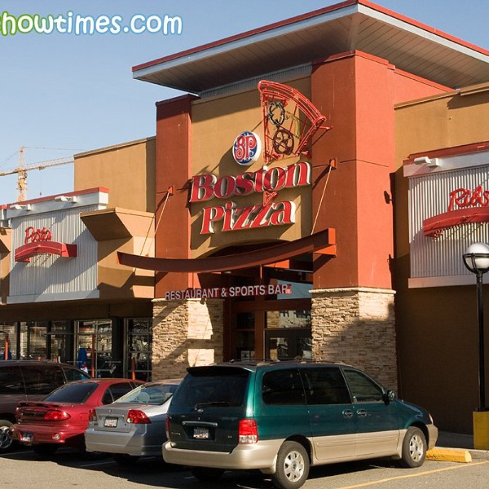 cars parked in front of a restaurant
