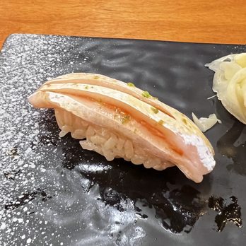 Neta Shari - Salmon with lime zest and yuzu juice - Sushi Bars Near Me - Brooklyn, New York Neta Shari - Salmon with lime zest and yuzu juice - Sushi Bars Near Me - Brooklyn, New York