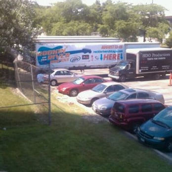 Rockin' on the River Ribfest - bus and cars parked in a parking lot - Food Near Me - Chicago, Illinois Rockin' on the River Ribfest - bus and cars parked in a parking lot - Food Near Me - Chicago, Illinois