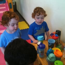 Odyssey Preschool - The boys at the water table.