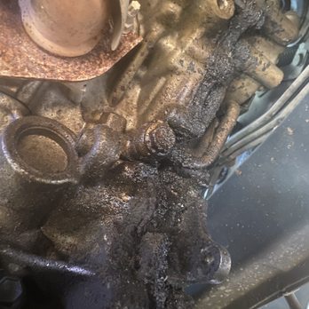 Johnson’s Automotive & Welding - Surface condition prior to work being started from buildup, leaking and dirt and grime - Auto Repair Near Me Johnson’s Automotive & Welding - Surface condition prior to work being started from buildup, leaking and dirt and grime - Auto Repair Near Me