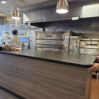 Basilico's Original Hand-Tossed Pizza - inside - Italian Near Me - Wellington, Florida Basilico's Original Hand-Tossed Pizza - inside - Italian Near Me - Wellington, Florida