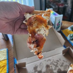 Ricardo's Pizza - A sloppy perogy pizza slice