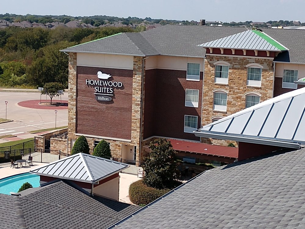 Slide of JC Custom Metal Roofing