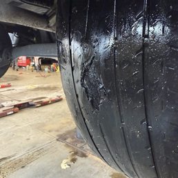 Tire so bald it looks like it's tearing Tire so bald it looks like it's tearing