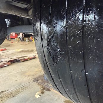 Midway Dodge - Tire so bald it looks like it's tearing - Auto Repair Near Me - Chicago, Illinois Midway Dodge - Tire so bald it looks like it's tearing - Auto Repair Near Me - Chicago, Illinois