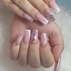 True Touch Nails & Spa - They are amazing talented! Everyone there is super friendly and welcoming. You ask and they do! Never disappoints! Love this place so much!