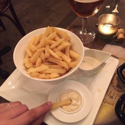 Frites with mayo, plus the mustard sauce for my mussels. Frites with mayo, plus the mustard sauce for my mussels.