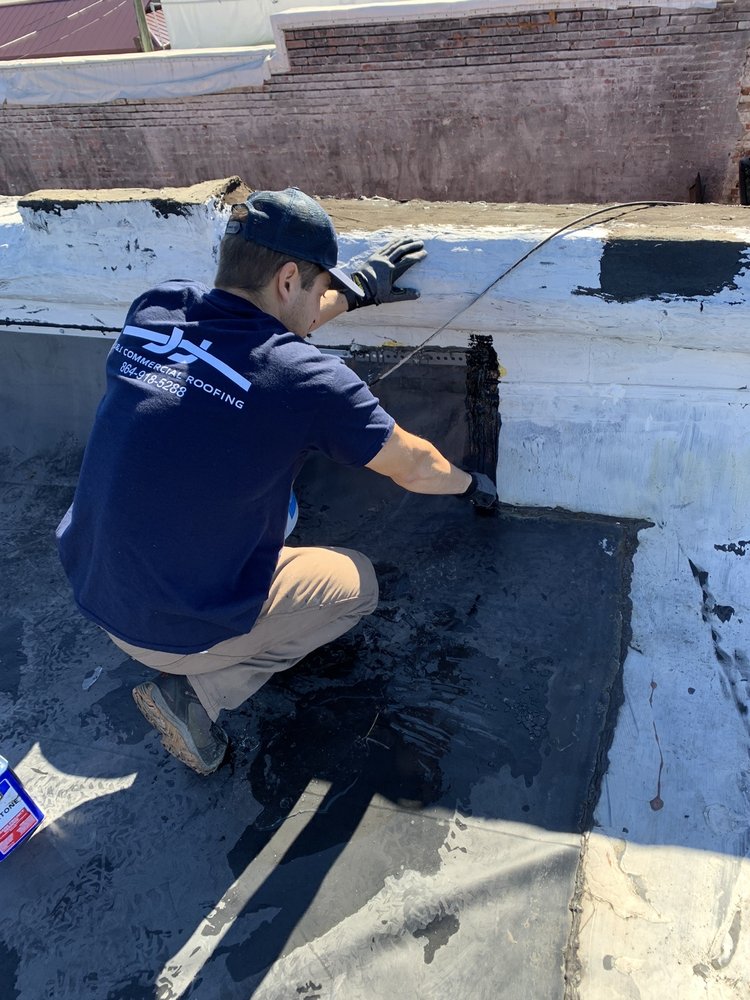 Slide of J&J Commercial Roofing