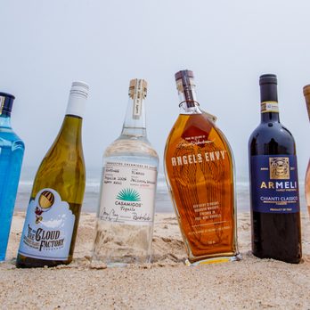 324 Wine & Spirits - a row of bottles on the beach - Beer, Wine & Spirits Near Me - East Hampton, New York 324 Wine & Spirits - a row of bottles on the beach - Beer, Wine & Spirits Near Me - East Hampton, New York