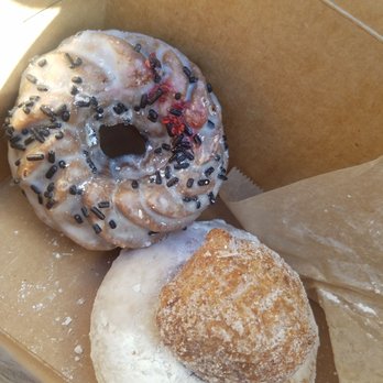 Pushkin's Bakery - Chocolate vanilla crueller, pumpkin donut hole, powdered donut underneath - Bakeries Near Me - Sacramento, California Pushkin's Bakery - Chocolate vanilla crueller, pumpkin donut hole, powdered donut underneath - Bakeries Near Me - Sacramento, California