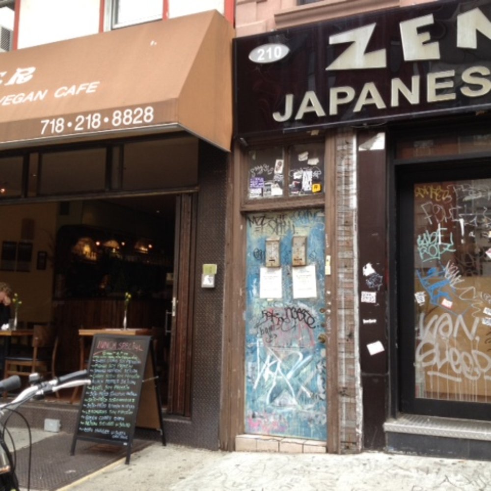 It's right between Wild Ginger and that restaurant that is always out of business. It's right between Wild Ginger and that restaurant that is always out of business.
