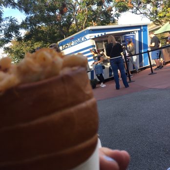 Taste Track - a person holding an ice cream cone - Sandwiches Near Me - Lake Buena Vista, Florida Taste Track - a person holding an ice cream cone - Sandwiches Near Me - Lake Buena Vista, Florida