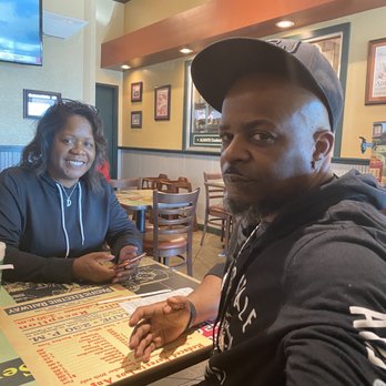 Wingstop - Tables, chairs - Chicken Wings Near Me - Raleigh, North Carolina