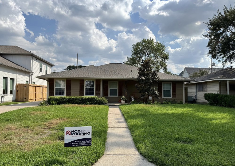 Slide of Noble Roofing