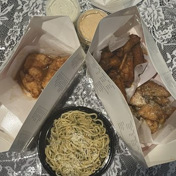 Wing Ferno - Thai chili tenders on left, mango habanero and garlic Parmesan on the right, side of garlic noodles on bottom - Chicken Wings Near Me - Buena Park, California Wing Ferno - Thai chili tenders on left, mango habanero and garlic Parmesan on the right, side of garlic noodles on bottom - Chicken Wings Near Me - Buena Park, California