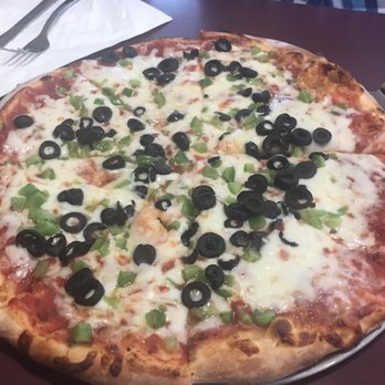 Twin's Pizza, Pasta & More - a pizza with olives and cheese - Pizza Near Me - Clio, Michigan