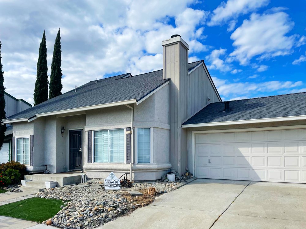 Slide of V Mendoza Roofing