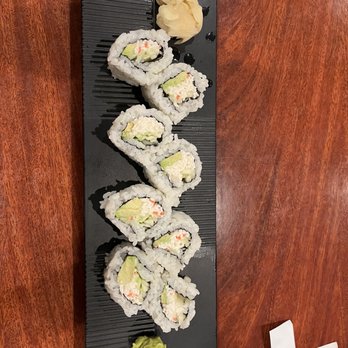 Oshima Sushi - a plate of sushi on a wooden table - Sushi Bars Near Me - Everett, Washington