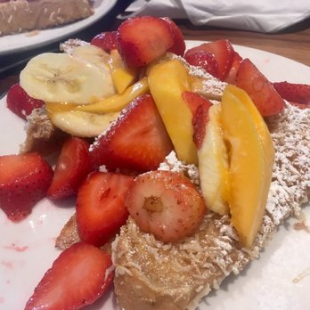 Plums Cafe - Most of them ordered the coconut French toast. They love it! - Breakfast & Brunch Near Me - Costa Mesa, California