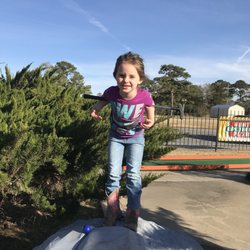 Putt Putt of Lake Charles - She kept climbing this rock over and over again :))