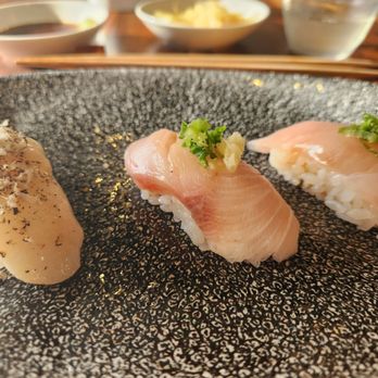OMAKAI sushi - From right to left, Kampachi, hamachi, scalop with shaved truffles, this was soo buttery. - Sushi Bars Near Me - Miami, Florida
