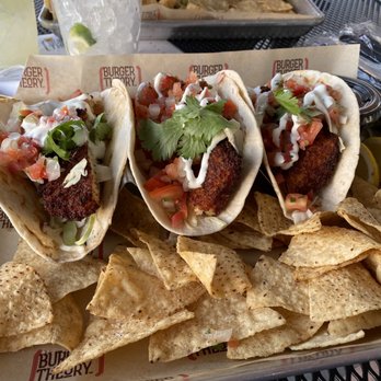 Burger Theory - three tacos and chips on a tray - Burgers Near Me - Joliet, Illinois Burger Theory - three tacos and chips on a tray - Burgers Near Me - Joliet, Illinois