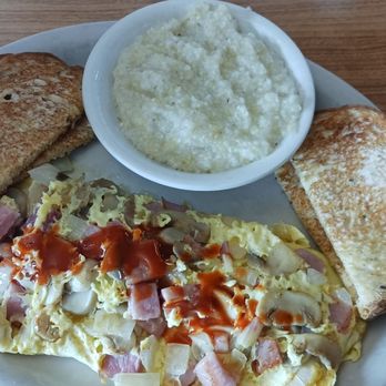 The Broken Yolk - Western Omelet. Grits. Rye Toast. - Breakfast & Brunch Near Me - Holiday, Florida The Broken Yolk - Western Omelet. Grits. Rye Toast. - Breakfast & Brunch Near Me - Holiday, Florida