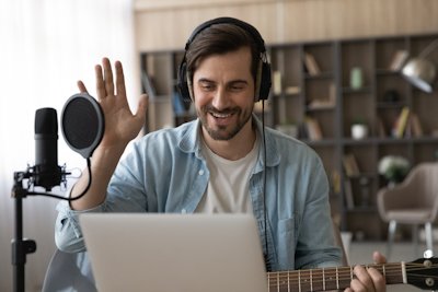Our Lessons - Our highly-trained instructors deliver fun, interactive, and efficient online lessons. We currently provide Guitar, Piano, Voice, Ukulele, Electric Bass, Drums, Mandolin, Violin, and Viola lessons! Book a free strategy call to get started! We use high-definition cameras, pro audio, and lighting to ensure you see and hear everything clearly. Lessons include screen-sharing, annotated sheet music, and engaging tools like play-along tracks and jam sessions.

During each lesson, your instructor takes notes, shares links, captures snapshots, and can even record parts of your session. Everything is instantly saved in a shared cloud folder—so you always have access to your materials, notes, and recordings. Our organized system makes it easy to track progress, review past lessons, and stay focused week after week!