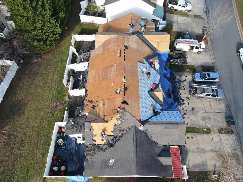 Slide of Roof and Restoration Experts
