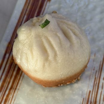Juicy Dumplings - Steam pork dumpling - yummy, but somewhat odd with the hard sesame coating on the bottom - Chinese Near Me - Euless, Texas Juicy Dumplings - Steam pork dumpling - yummy, but somewhat odd with the hard sesame coating on the bottom - Chinese Near Me - Euless, Texas