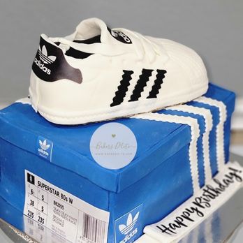 Bakers D'lite - a pair of shoes on top of a cake - Bakeries Near Me - Wylie, Texas