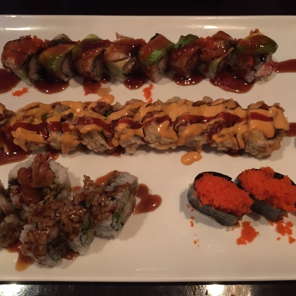 Sushi Sumo - Top to bottom: Dragon, Dynamite, shrimpTempura, Flying fish (tobiko) - Japanese Near Me - Newark, Delaware Sushi Sumo - Top to bottom: Dragon, Dynamite, shrimpTempura, Flying fish (tobiko) - Japanese Near Me - Newark, Delaware