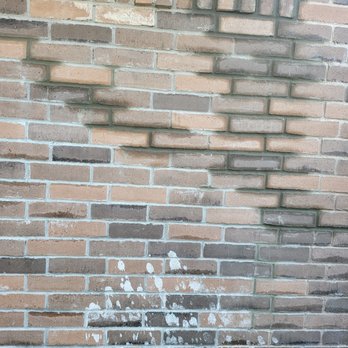 Amaro Construction - Where the cracks started at upper left of wall.  Here he also replaced a couple bricks - Masonry/Concrete Near Me